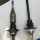 Compare and contrast. The new hotness is 2" longer, black powder coated and with the fulcrum point changed, is a true short shift.
